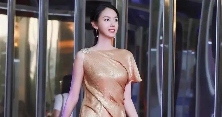 世界選美冠軍張梓琳：腿長1.22米，拒嫁豪門嫁普通人，她後悔了嗎