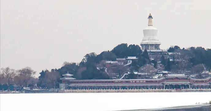 雪映白塔！北海公園氛圍感拉滿